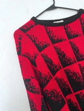 Load image into Gallery viewer, Vintage sweater in a nice red color with an allover black fading cube design.