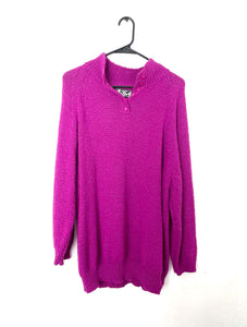 vintage sweater in a vibrant magenta color with top buttons.